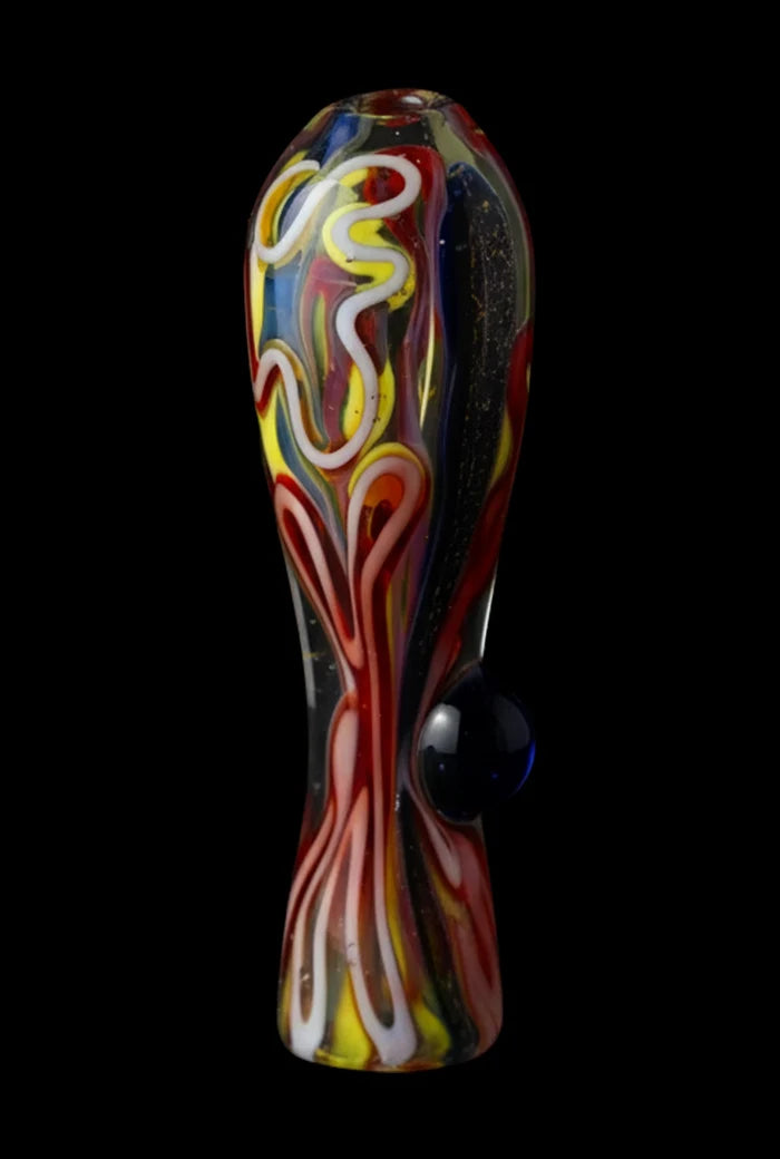 Close-up front view of the Brain Fold Chillum Pipe showing its multicolored swirls and raised blue glass dot against a black background