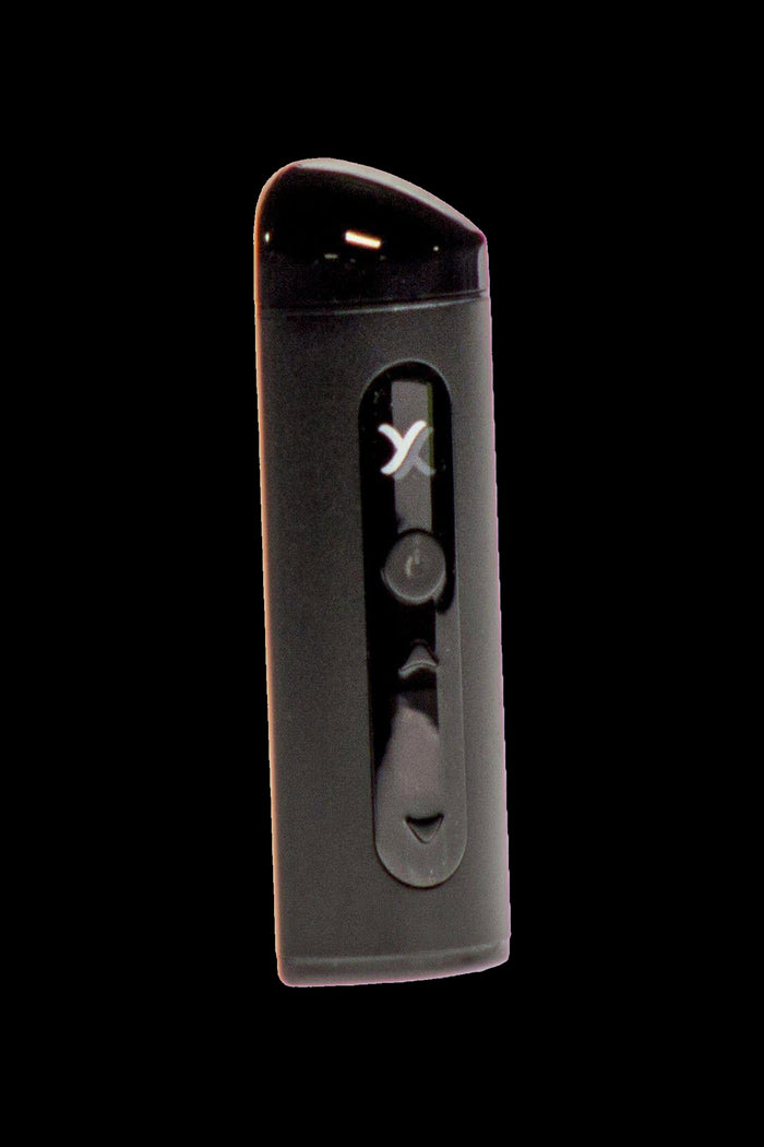 Front view of the Exxus Mini Vaporizer, a sleek, black device presented against a dark, neutral background.