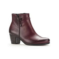 Women’s leather heeled ankle boots in burgundy with side zip and buckle strap detail