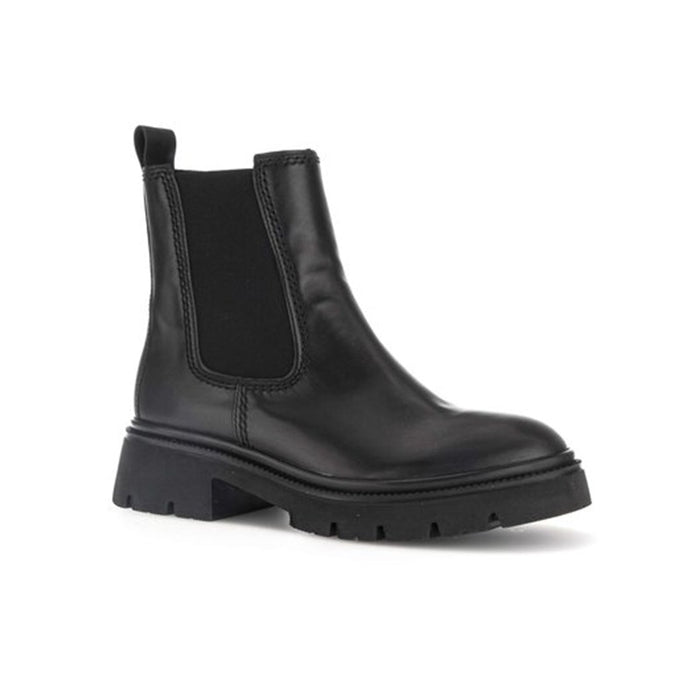 Black leather Chelsea boots with side elastic panels and block heel, lug sole