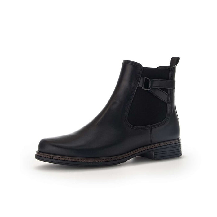 Black leather ankle boot with side buckle strap and Chelsea-style elastic panel