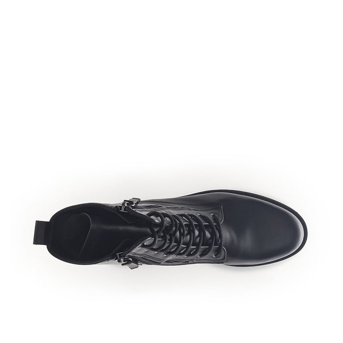 Black leather women's ankle boots with laced front and ridged rubber sole