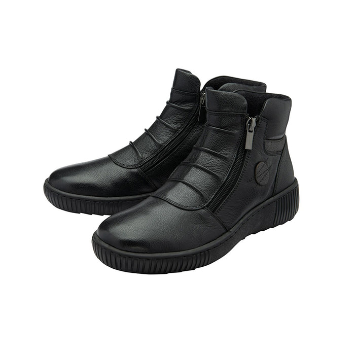 Black leather ankle boots with side zipper and molded upper panels, chunky tread sole.