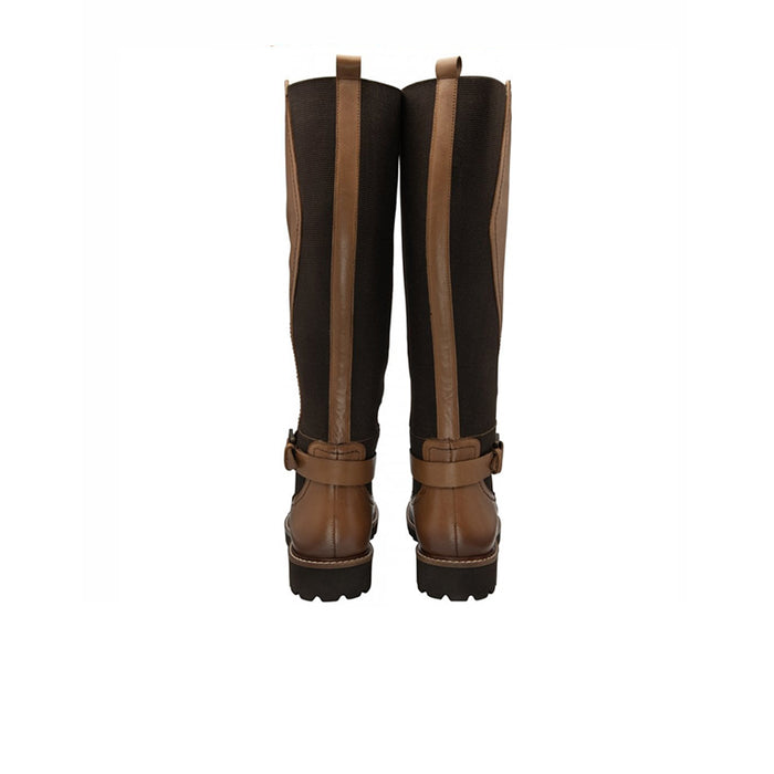 Pair of brown knee-high boots with side zippers and buckle ankle straps, lug soles.