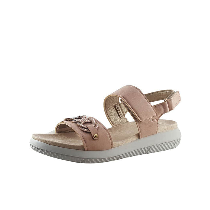 Pink open-toe sandals with crisscross decorative strap and hook-and-loop closure