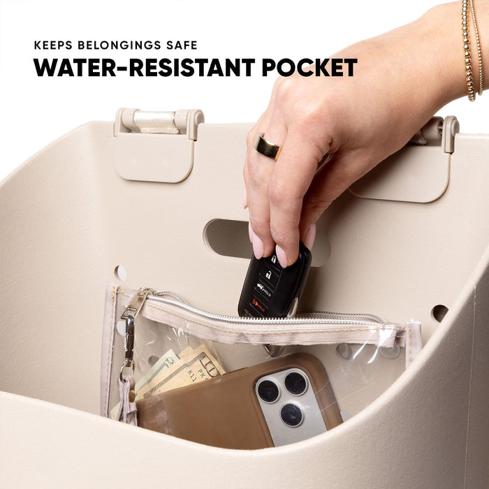 Cream-colored Getaway Backpack with woman's hand inserting black car key fob into water-resistant pocket containing wallet, phone, and cash. Text reads "Keeps Belongings Safe - Water-Resistant Pocket."