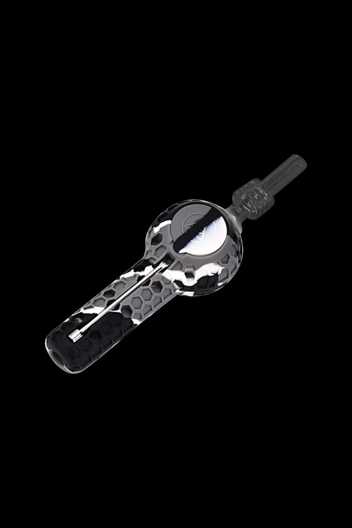 Black and white glass oil rig with a clear mouthpiece, isolated on a black background.