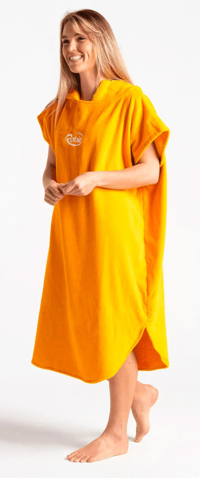 Robie Original Changing Robe in bright orange, hooded, worn by a woman, front view
