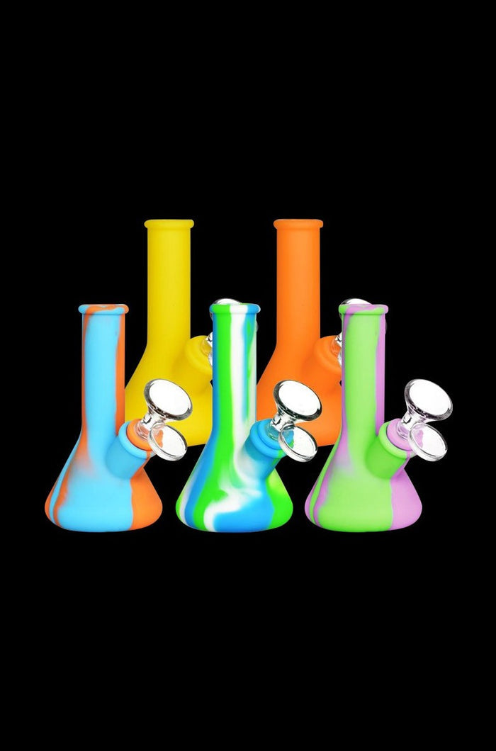 Front-facing group shot of five colorful Silicone Beaker Travel Bong - Lil' Doink pieces on a black background, shown in neon yellow, orange, blue/orange, green/white/blue, and green/pink.