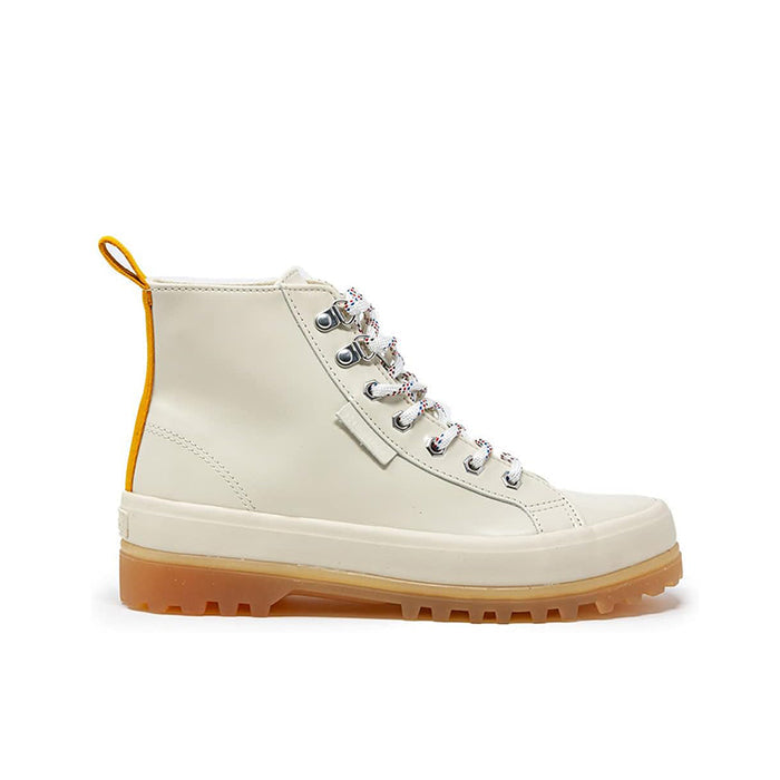 Beige leather lace-up ankle boots with yellow pull loop and low-profile lug sole