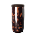 16-ounce tortoiseshell tumbler with dark brown and black mottled pattern, bright white vertical accent stripe, and matte black lid on white background
